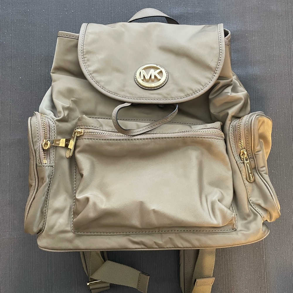 Michael Kors gold backpack